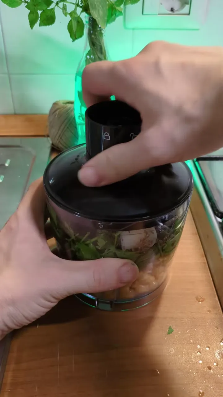 The coarse green falafel mixture in a bowl